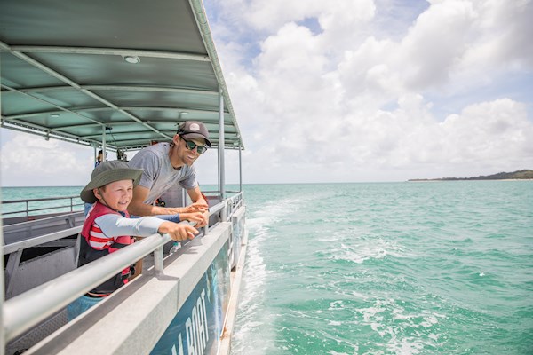 Searching for dugongs on the Marine Discovery Cruise