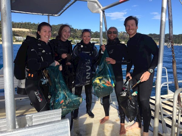 Divers with the rubbish collected